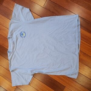 Men's short sleeve Tshirt XL Billabong. Light blue with yellow, teal and blue